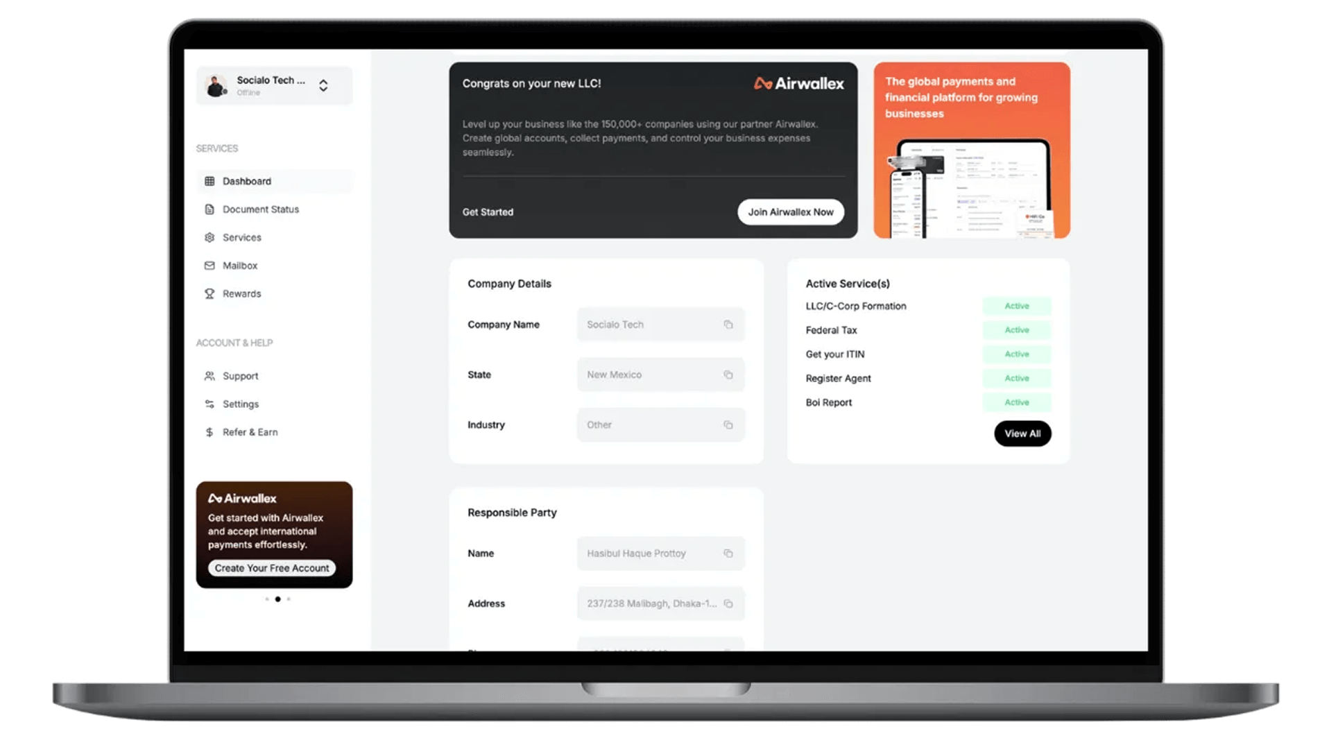 Laptop displaying LLC client dashboard with company details, responsible party information, and active service status overview.