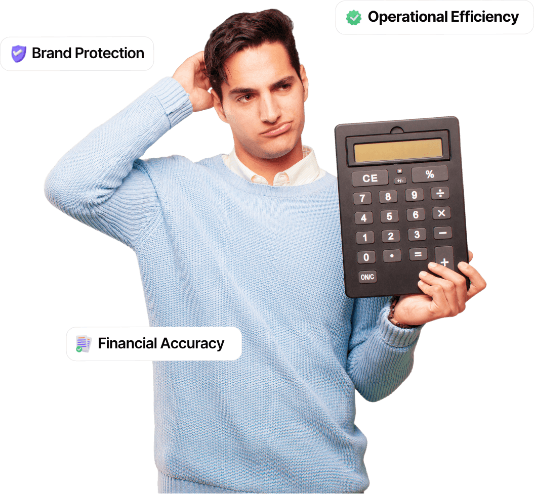 Entrepreneur holding a calculator representing financial accuracy, brand protection, and operational efficiency in business.